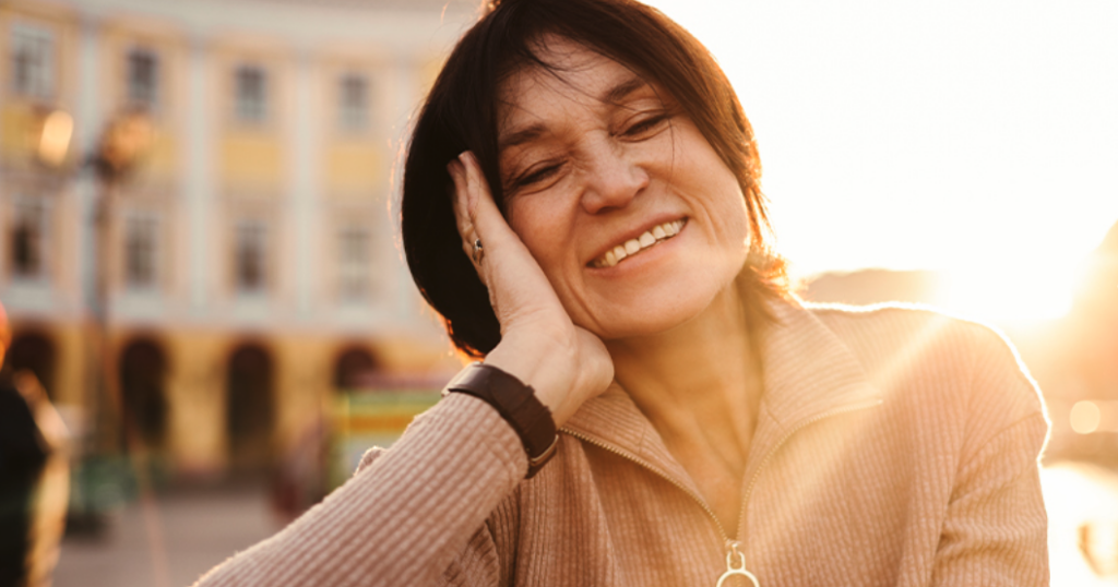 Woman Smiling in the Sun